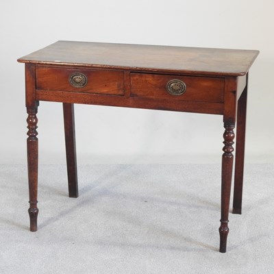 Lot 262 - A 19th century mahogany side table, containing...