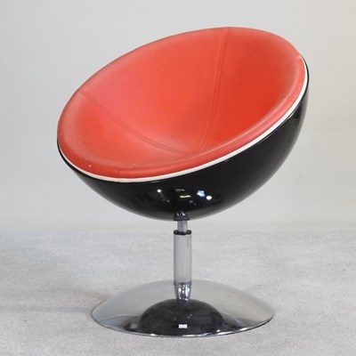 Lot 16 - A half moon swivel lounge chair, on a metal...