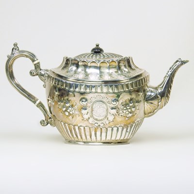 Lot 6 - A Victorian silver teapot, of oval shape with...