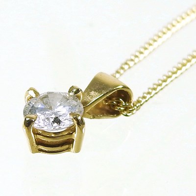 Lot 140 - An 18 carat gold solitaire diamond pendant...