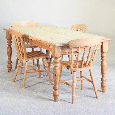 Lot 526 - A pine rectangular dining table, 179cm wide,...