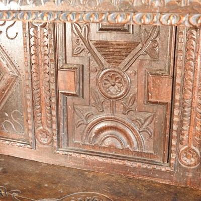 Lot 56 - A 17th century style heavily carved oak court...