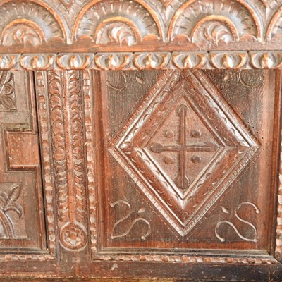 Lot 56 - A 17th century style heavily carved oak court...