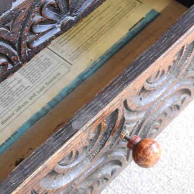 Lot 56 - A 17th century style heavily carved oak court...