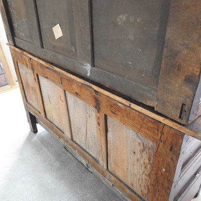 Lot 56 - A 17th century style heavily carved oak court...