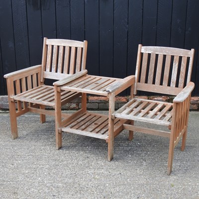 Lot 218 - A wooden garden bench, with a table centre