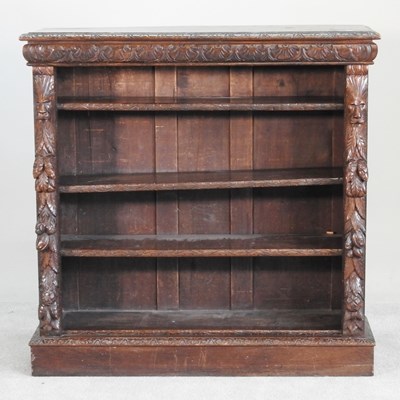 Lot 271 - A 19th century heavily carved dark oak dwarf...