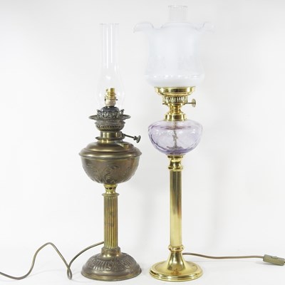 Lot 286 - A brass oil lamp, 73cm high, together with...
