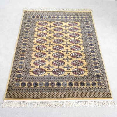 Lot 421 - A Bokhara rug, with rows of medallions, on a...