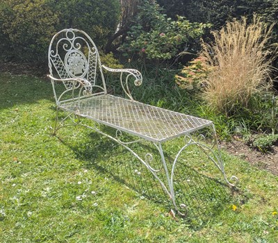 Lot 91 - A white painted metal garden day bed