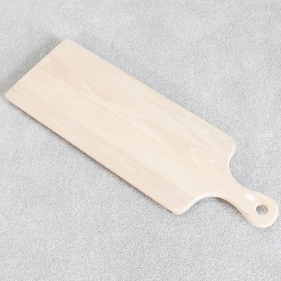 Lot 667 - A hand made wooden cheese board, 75cm long