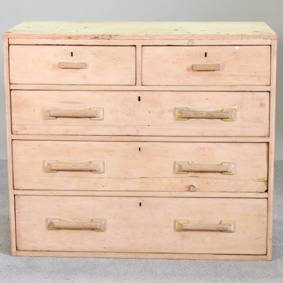 Lot 190 - An early 20th century stripped pine chest of...