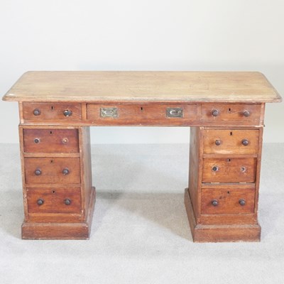 Lot 412 - A Victorian pedestal desk, containing nine...