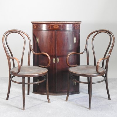 Lot 348 - A George III mahogany and inlaid bow front...