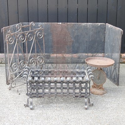 Lot 440 - A wrought iron fire grate, 75cm wide, together...