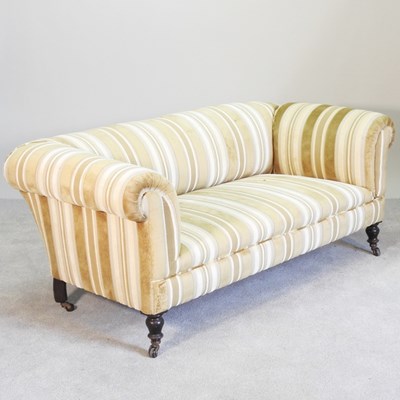 Lot 104 - An early 20th century upholstered drop end...