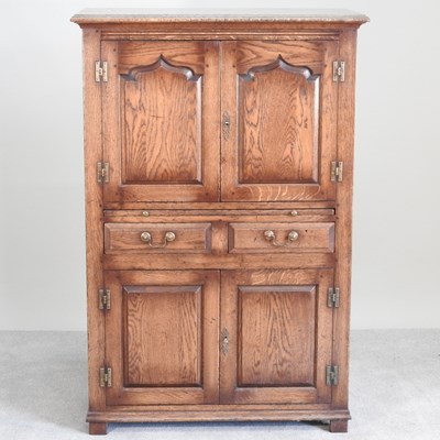 Lot 37 - An oak cabinet, of 18th century style, in the...