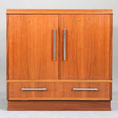 Lot 445 - A mid 20th century teak side cabinet