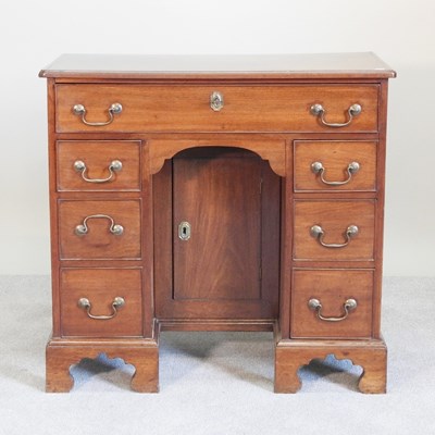 Lot 416 - A 19th century mahogany kneehole desk,...