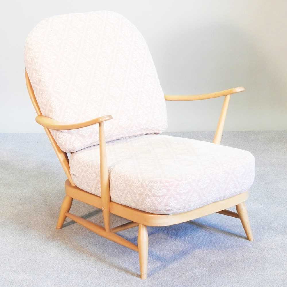 Lot 20 - A 1970s Ercol light elm Windsor armchair, with...