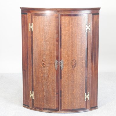 Lot 406 - A George III oak and mahogany crossbanded bow...