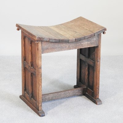 Lot 95 - An Arts and Crafts oak foot stool, with a...