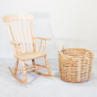 Lot 254 - A beech splat back rocking chair, together...