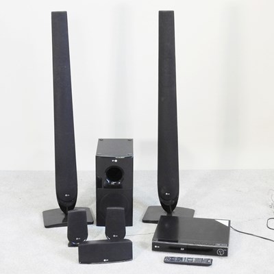 Lot 480 - An LG surround sound speaker system, together...