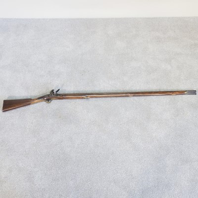 Lot 200 - A 19th century flintlock rifle, with a brass...