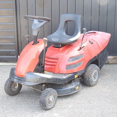 Lot 174 - A red Husqvarna petrol ride-on lawn mower