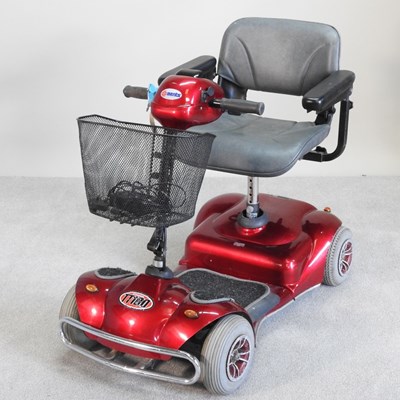 Lot 683 - A red Honda TT180 electric mobility scooter,...