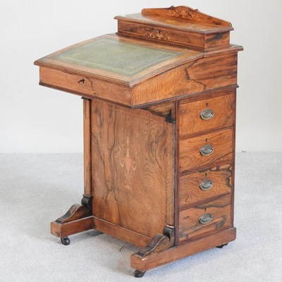 Lot 488 - A late Victorian rosewood and inlaid davenport,...