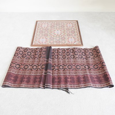 Lot 562 - A framed fabric, together with an Eastern wall...