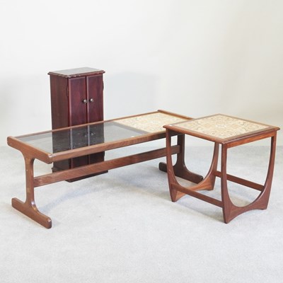 Lot 610 - A 1970s G Plan style teak coffee table, with a...