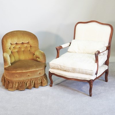 Lot 582 - A cream upholstered show frame open armchair,...