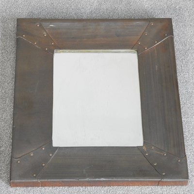 Lot 260 - An Arts and Crafts style copper framed wall...