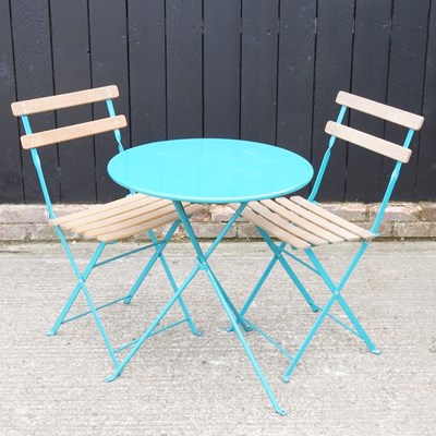 Lot 476 - A blue painted metal folding bistro table,...