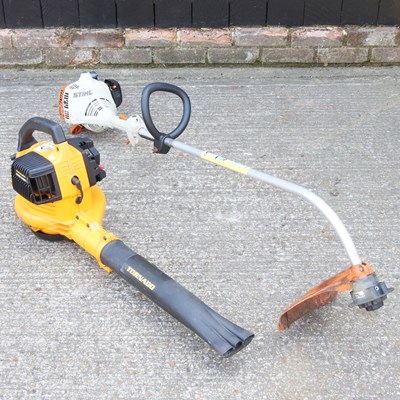 Lot 615 - A Stihl petrol garden strimmer, together with...