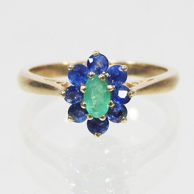 Lot 168 - A modern 9 carat gold, emerald and sapphire...