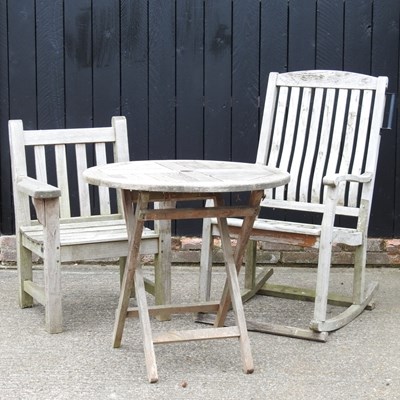 Lot 449 - A teak garden armchair, together with a...