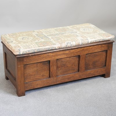 Lot 269 - An oak coffer, 20th century, with a hinged lid...
