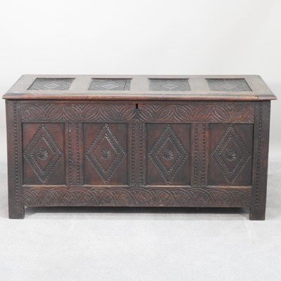 Lot 208 - An 18th century oak coffer, with lozenge...