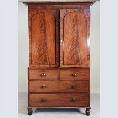 Lot 531 - A 19th century mahogany linen press, the upper...