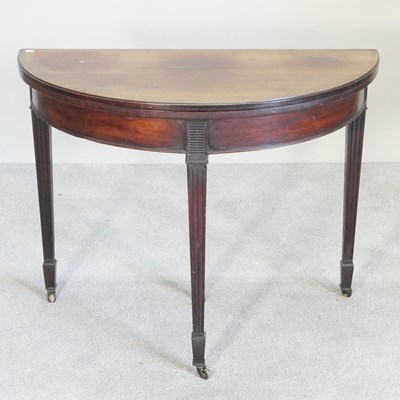 Lot 570 - A George III mahogany D-shaped folding card...