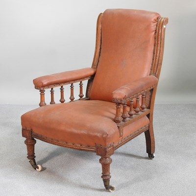 Lot 514 - A Victorian brown upholstered armchair, on...
