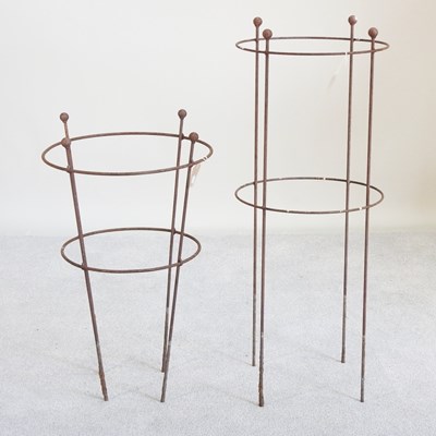 Lot 574 - A rusted metal plant support, 104cm high,...