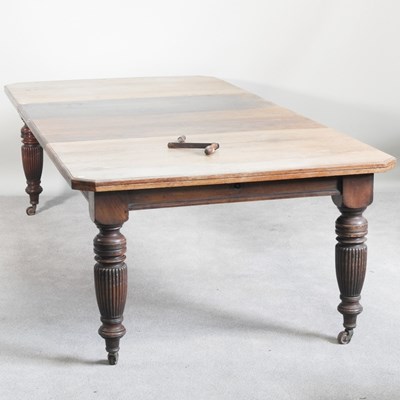 Lot 251 - A late Victorian walnut wind-out extending...