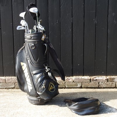Lot 429 - A set of golf clubs, with a golf bag