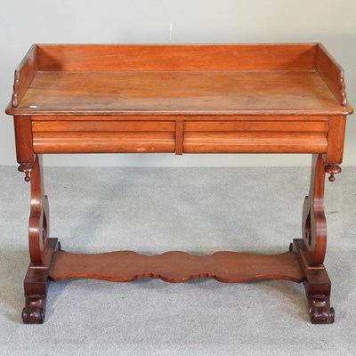 Lot 257 - A Victorian mahogany sofa table, with a...