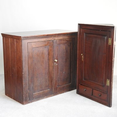 Lot 228 - An 18th century oak hanging corner cabinet,...